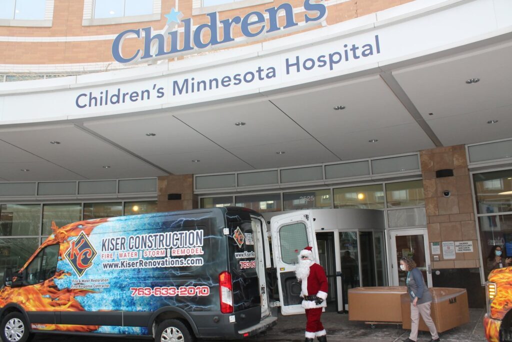 santa clause arriving at children's minnesota