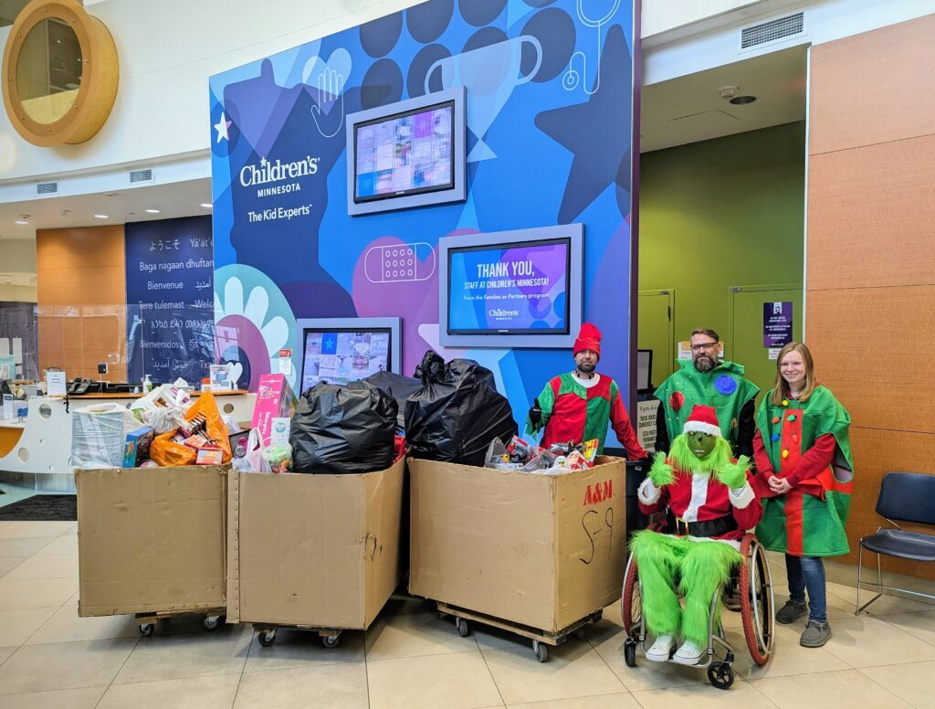 kiser construction crew dropping off toy donations for children's minnesota