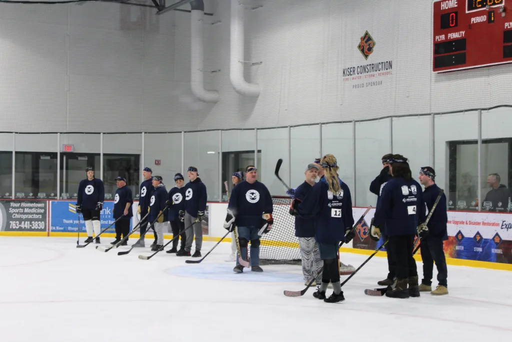 elk river police department getting ready for guns n hoses hockey game