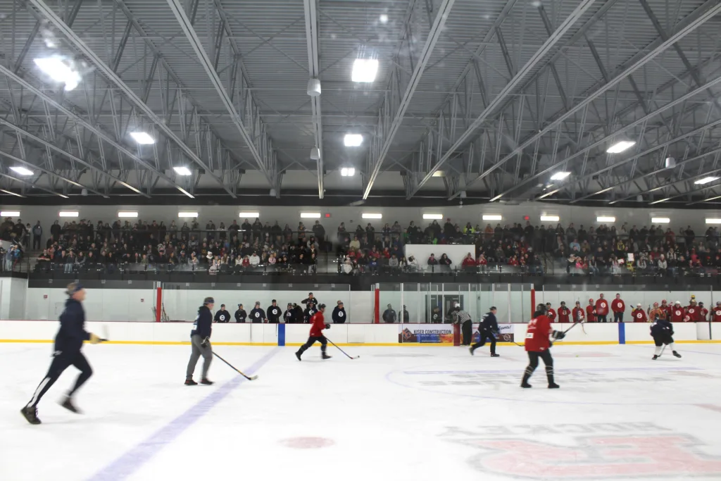packed stands at the elk river guns n hoses hockey game