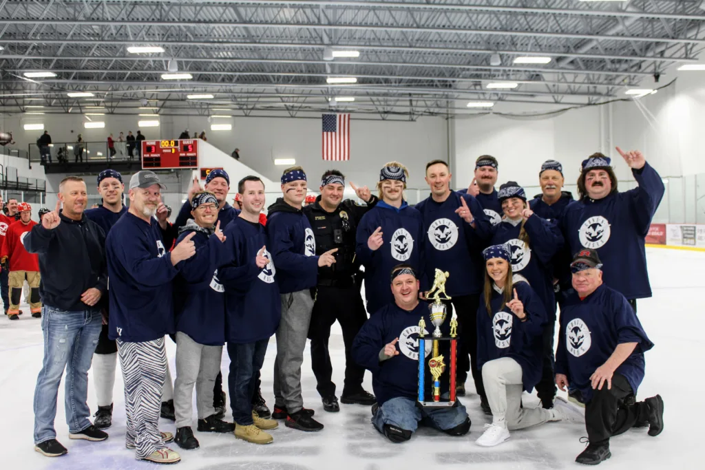 elk river police department win guns n hoses hockey game