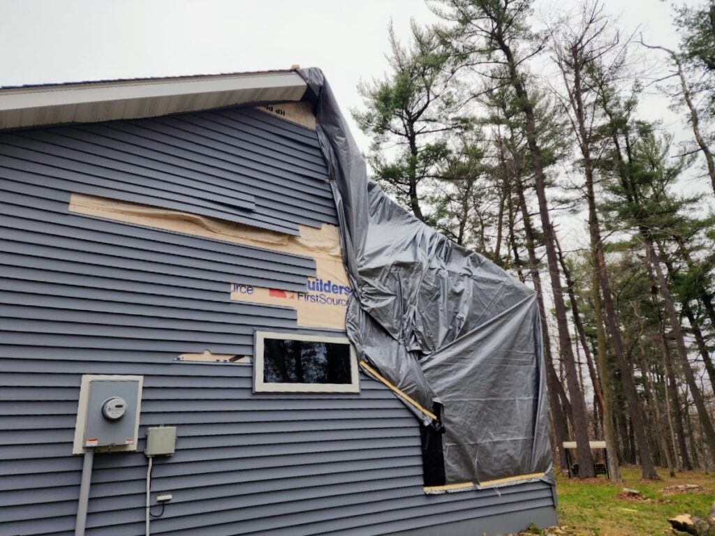 emergency tarping after storm damage